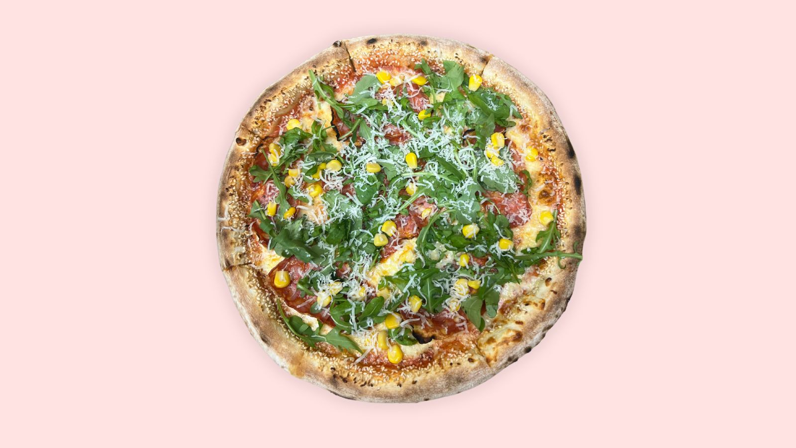 Spianata verde pizza with rocket and corn